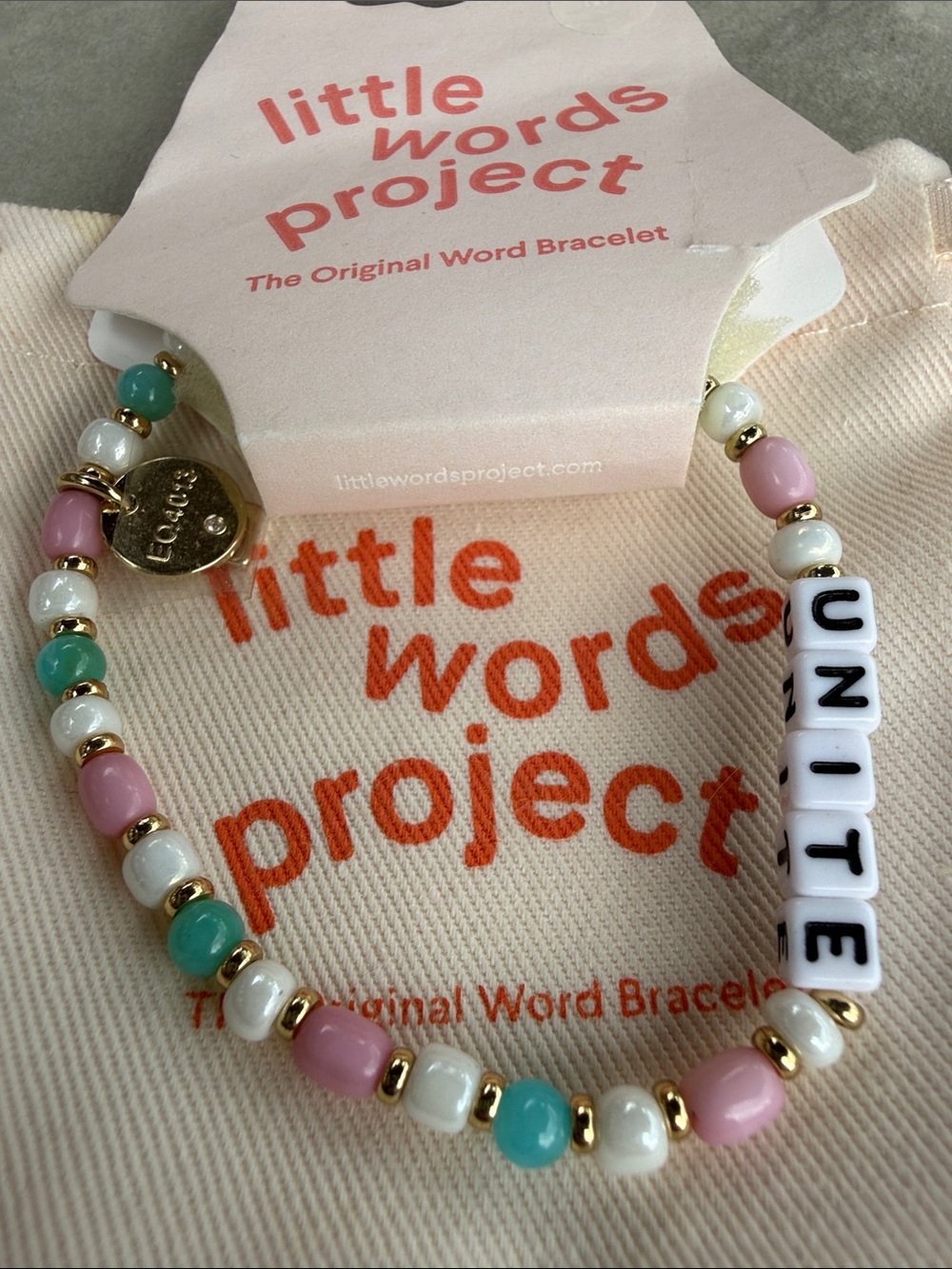 Little Words Project "UNITE" Beaded Bracelet in Pink, Teal & White